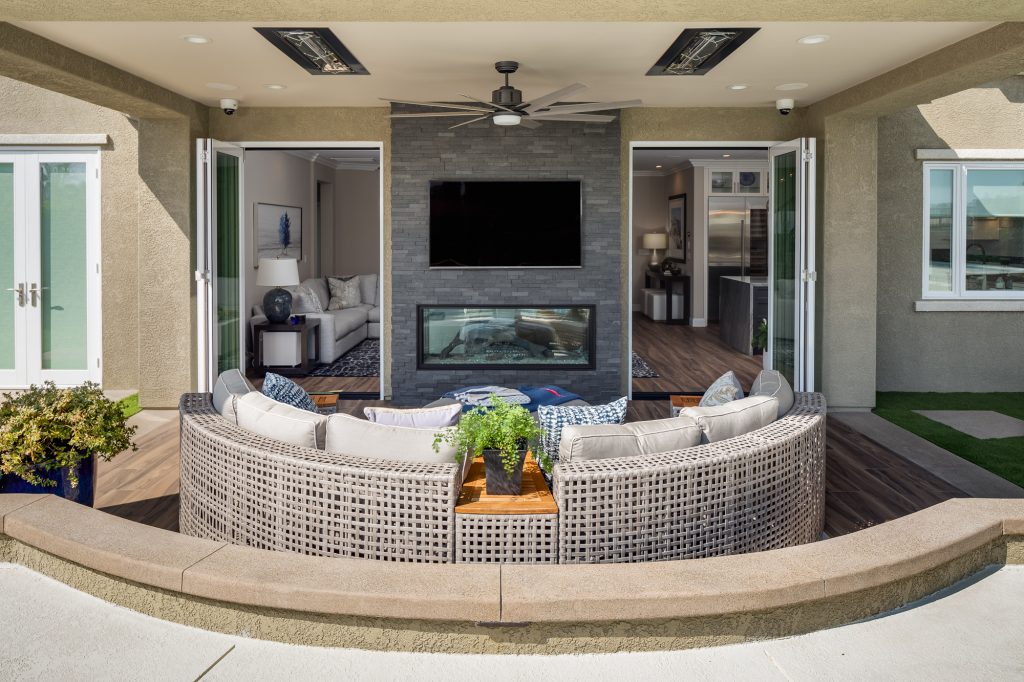 Exterior view of fireplace outdoor living remodel