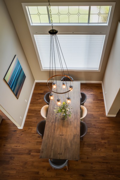 Remodeled Dining Room with beautiful wood floors and wooden table Marrokal.com